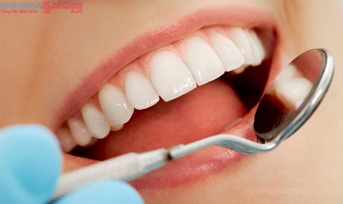 Bọc răng sứ lợi và hại thế nào?